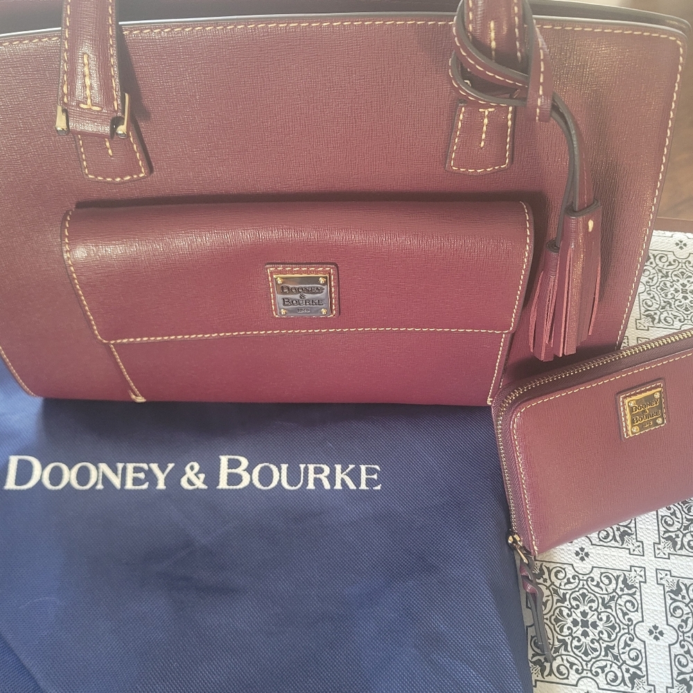 Dooney and Bourke handbag with matching wallet.